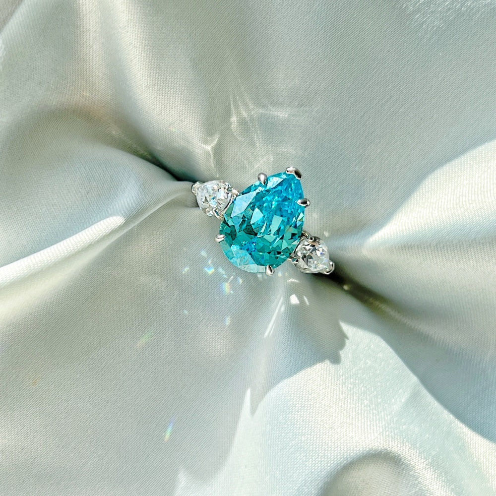 Bella's Sterling Silver Engagement Ring with Blue Topaz Cubic Zircon Stone