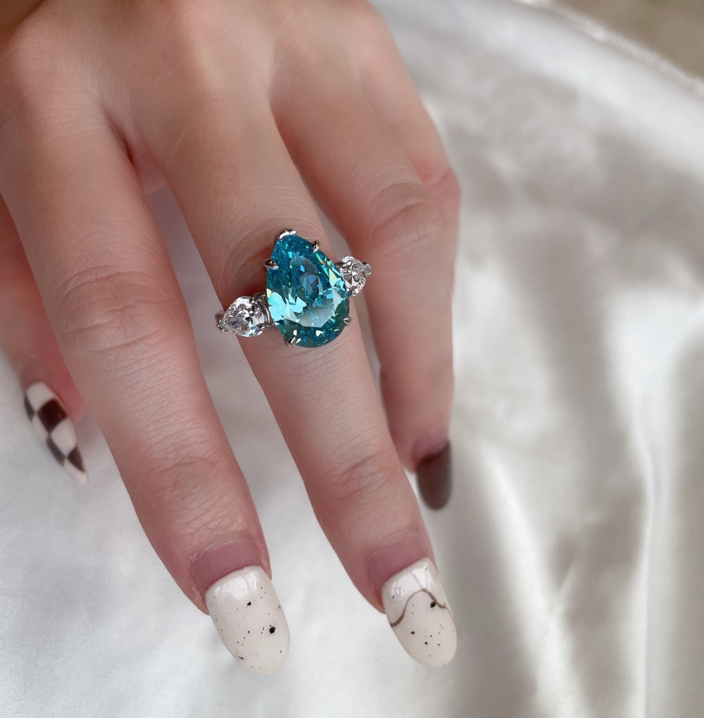 Bella's Sterling Silver Engagement Ring with Blue Topaz Cubic Zircon Stone